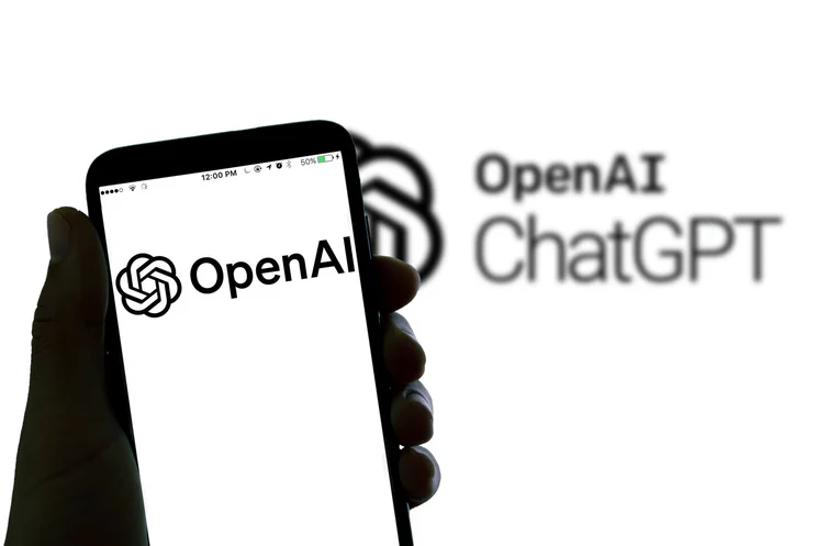 OpenAI logo on phone screen