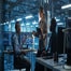 Employees discussing technology in lab