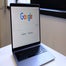 Google Search on laptop on desk