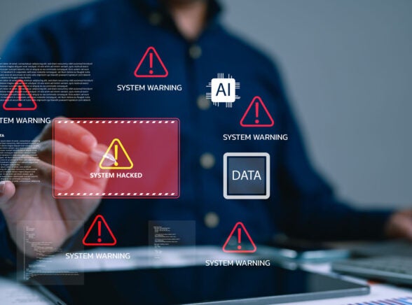 Person working on tablet experiencing data breach