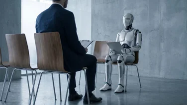 Businessman interviewing robot