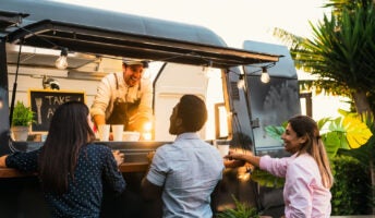 People queuing at food truck