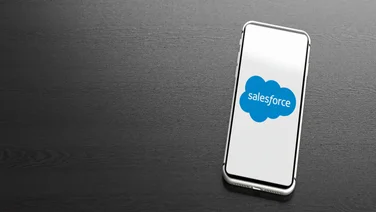Salesforce logo on phone background