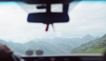 The road view from a truck dashboard