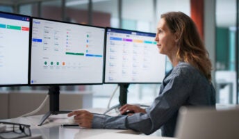 Person doing payroll on computer