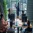 Team brainstorming in office on computers