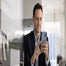Male executive on phone in office
