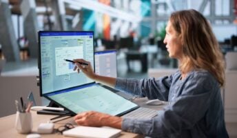 Marketer using touchscreen