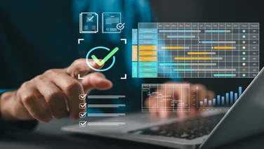 Person using project management software on laptop