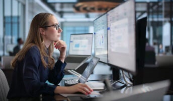 Officer worker using HR software on desktop