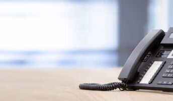 VoIP deskphone on desk