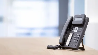 VoIP deskphone on desk