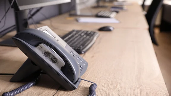 VoIP desk phone on office table