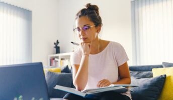 Woman studying at laptop