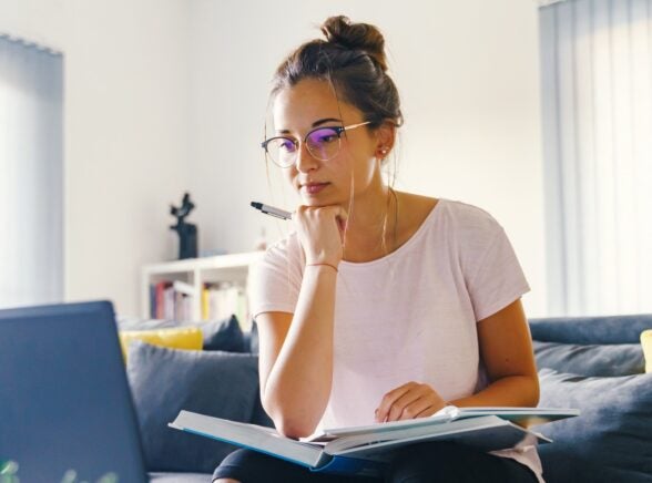 Woman studying at laptop