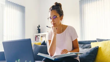 Woman studying at laptop
