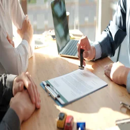 Hand stamping contract on desk